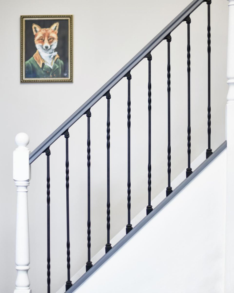 Matte Black "Enfield" Double Twist Stair Spindle in Situ in the Home