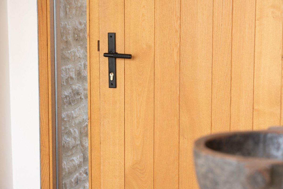 Matte Black Slimline Lever Espag Door Handle on Door