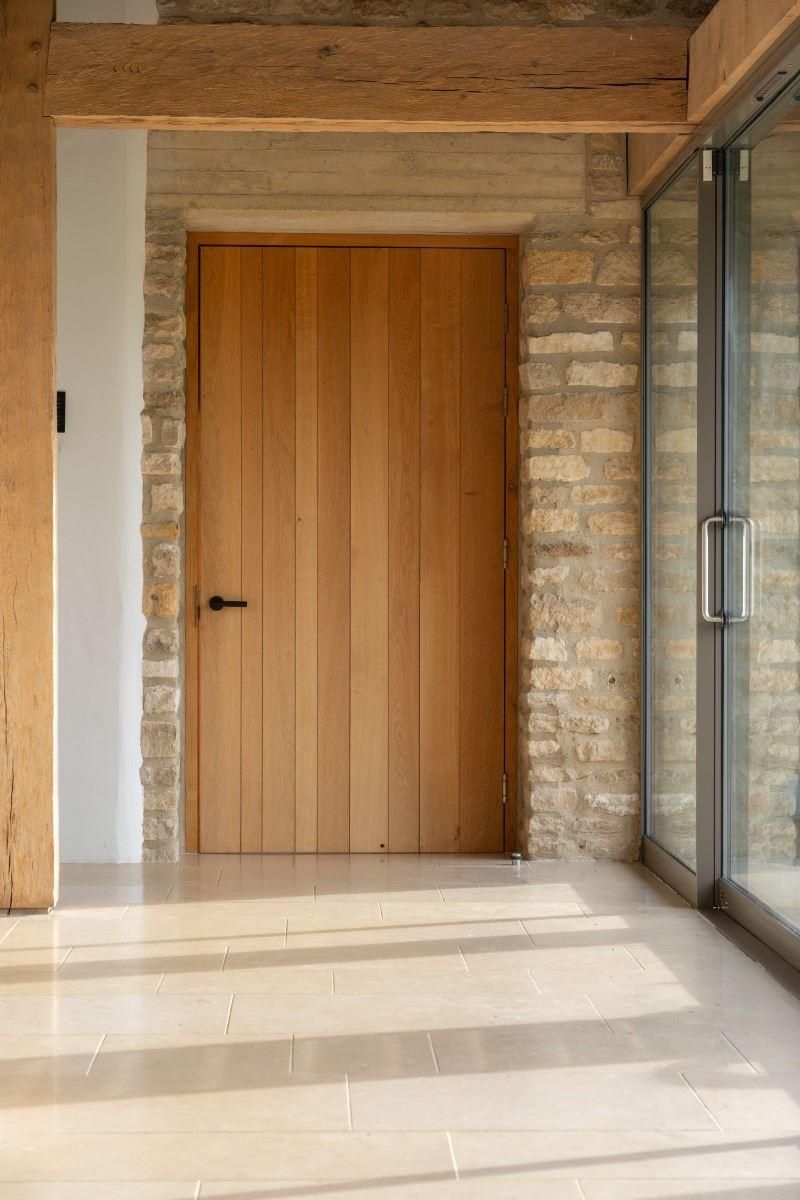 Matte Black Textured Lever Door Handle on Art Deco Rose in Situ