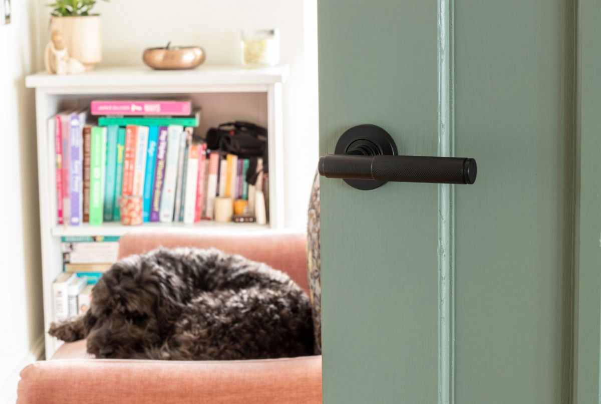 Matte Black Textured Lever Door Handle on Rose in Situ