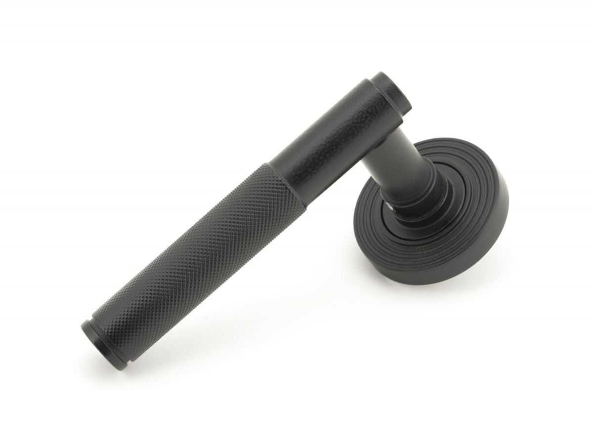 Matte Black Textured Unsprung Lever Door Handle on Beehive Rose Matte Black Textured Unsprung Lever Door Handle on Beehive Rose