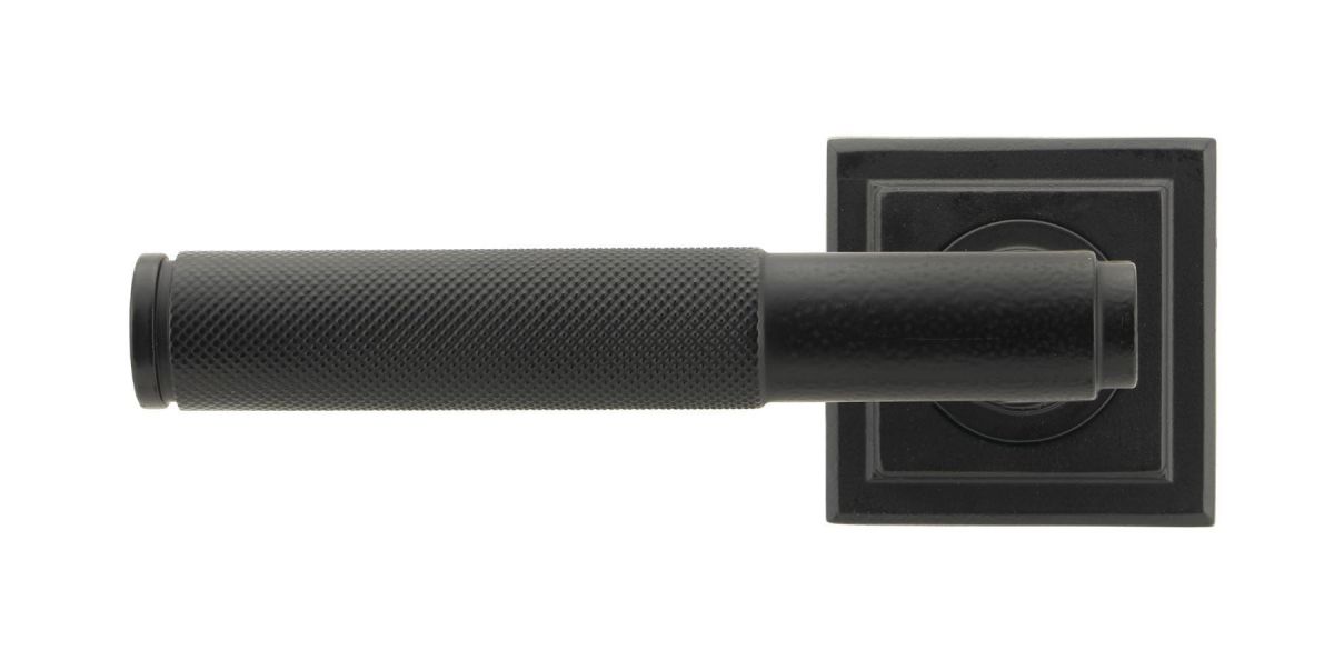 Matte Black Textured Unsprung Lever Door Handle on Square Rose Front