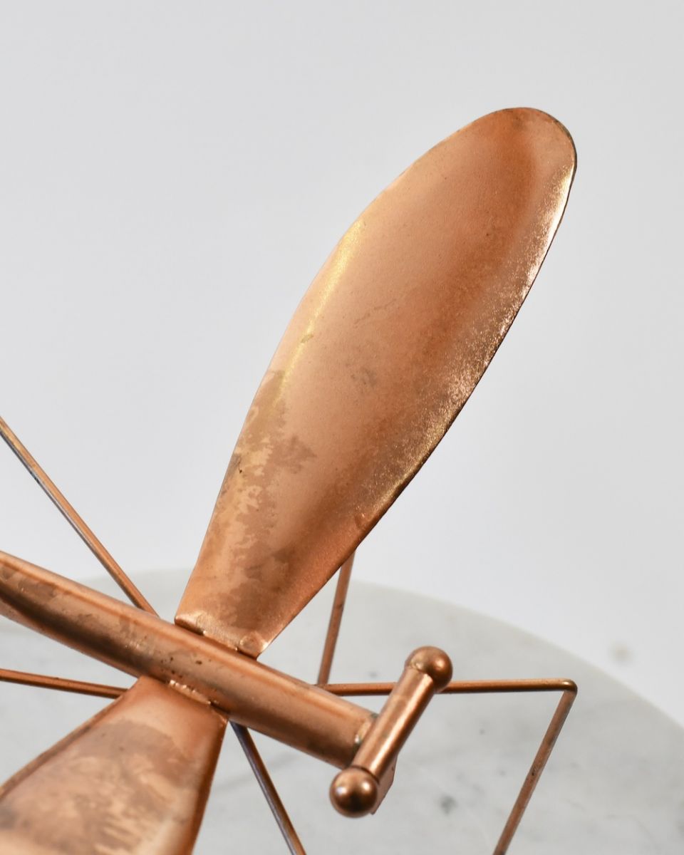 Close up of wings and body detail on recycled metal sculpture Close up of wings and body detail on recycled metal sculpture