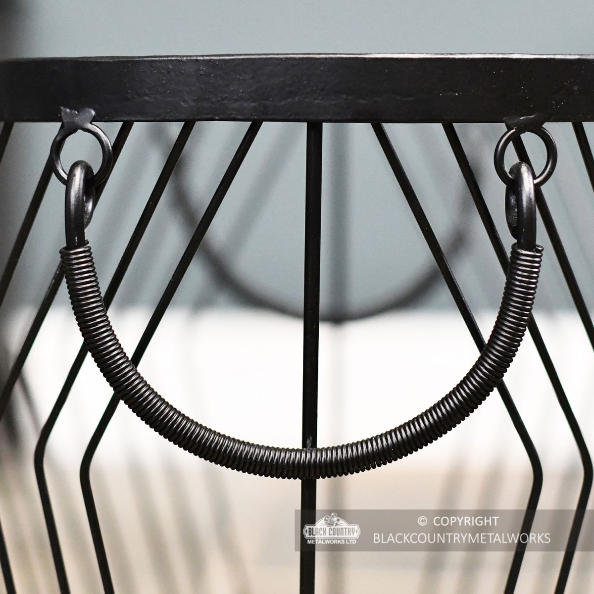 Close-up of the Carry Handles on the Side of the Log Basket Close-up of the Carry Handles on the Side of the Log Basket