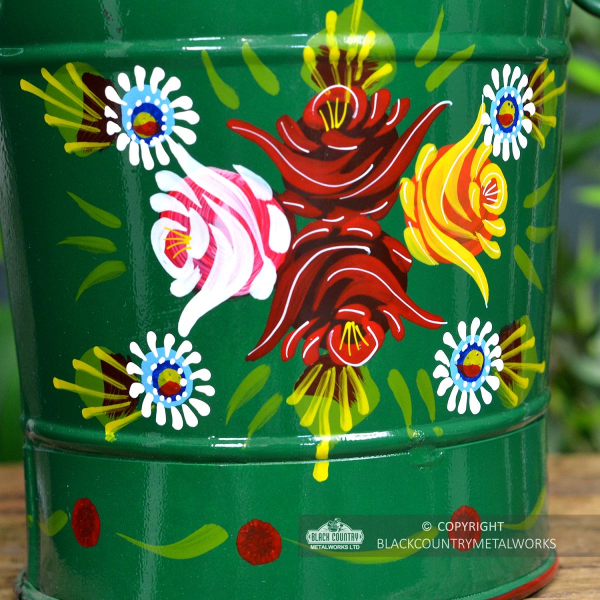 Close-up of the Rose Design on the Green Bucket