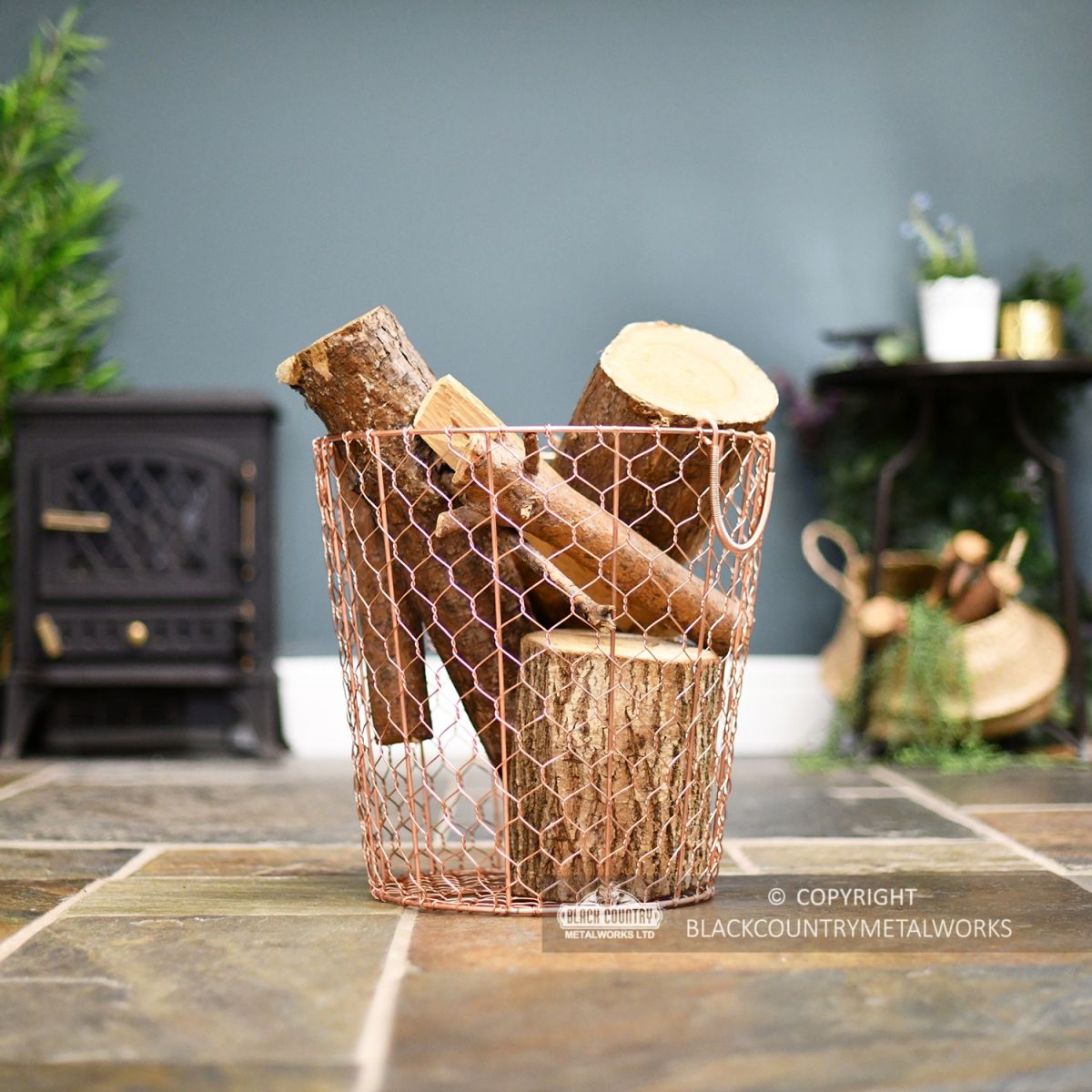 Rose Gold Wire Log Basket in Situ Next to the Fire Place