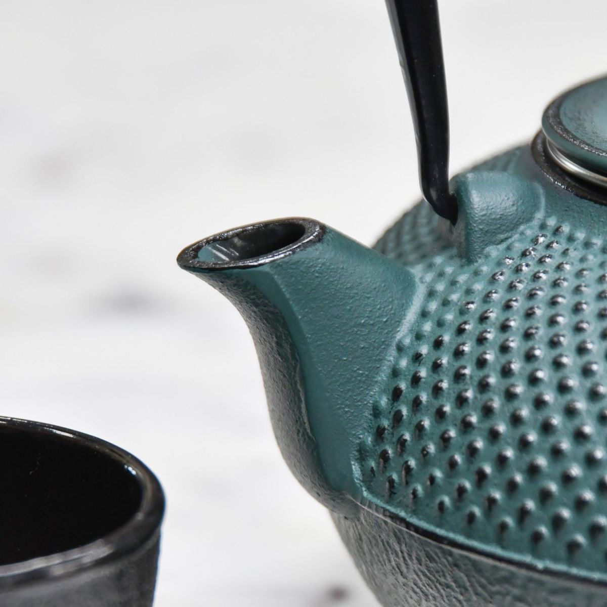 Close-Up of Spout of Midnight Green Cast Iron Teapot 