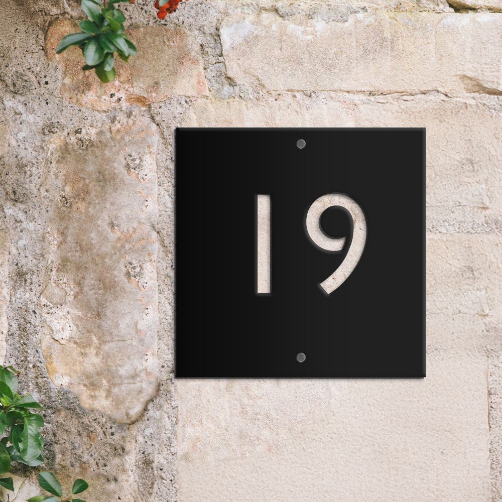 Modern Black Square House Number Sign on brick wall