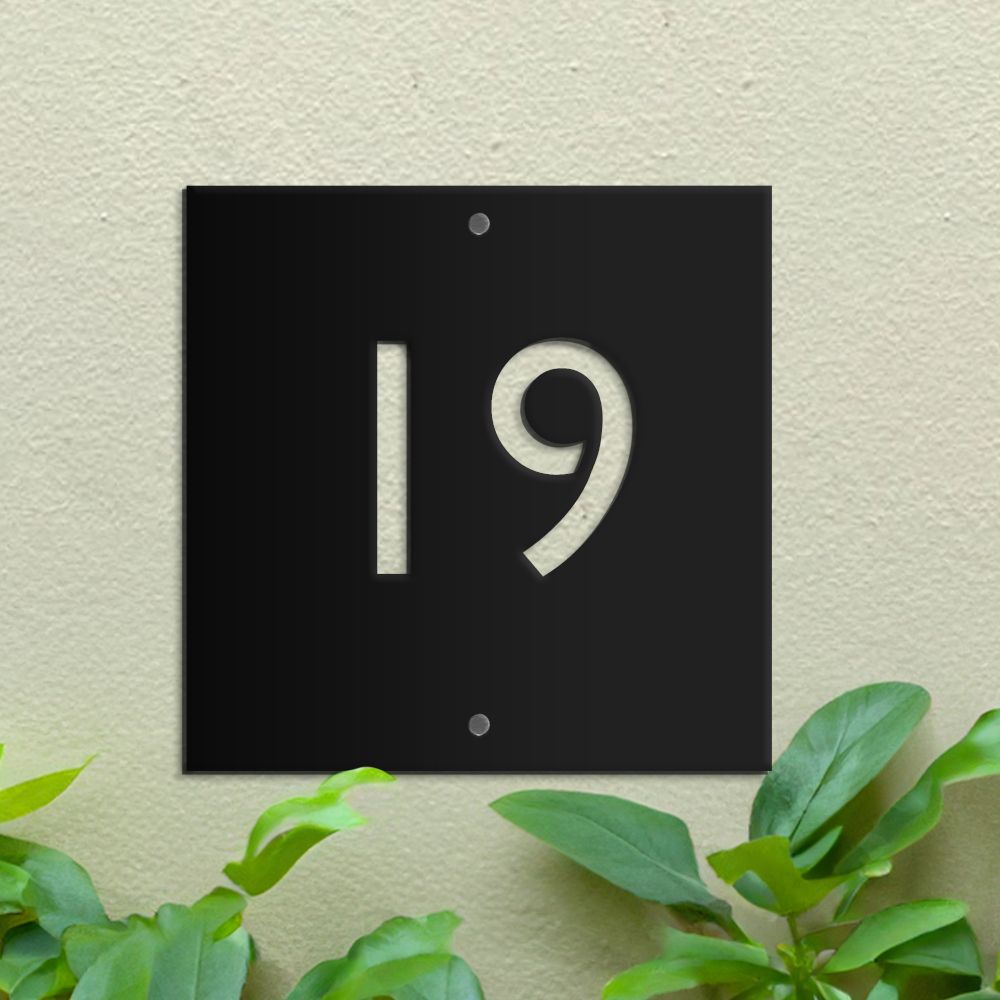 Modern Black Square House Number Sign on green wall