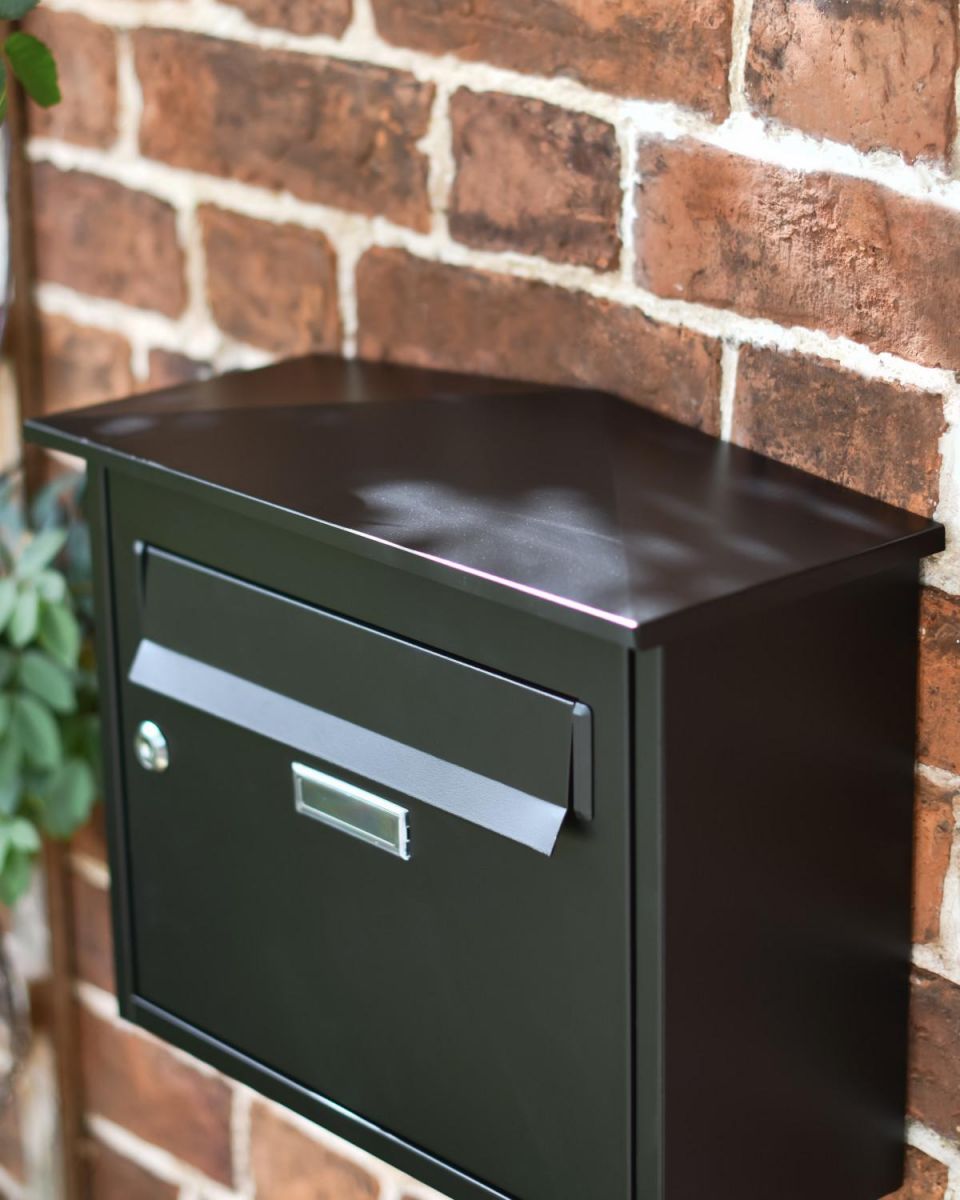Close-Up of Modern Black Steel Front Opening Wall Mounted Post Box with Lock
