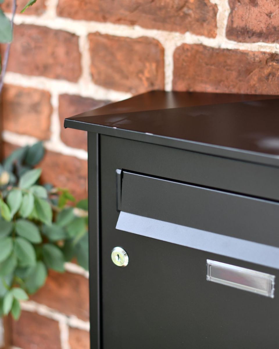 Close-Up of Front Opening Letter Plate on Modern Black Steel Front Opening Wall Mounted Post Box with Lock