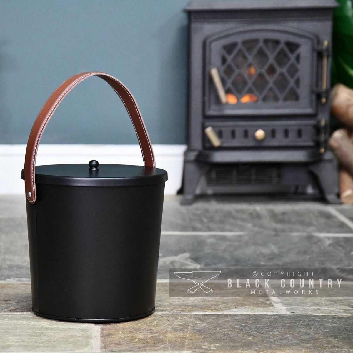 Black Modern Ash Bucket in Situ Next to the Fire Place