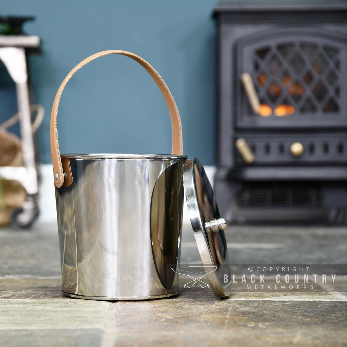 Modern Stainless Steel Ash Bucket in Situ Next to the Fire Place