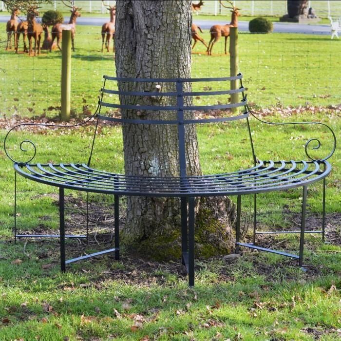 Black "Monmouthshire" Wrought Iron Deluxe Tree Seat in Situ by a TRee in the Garden