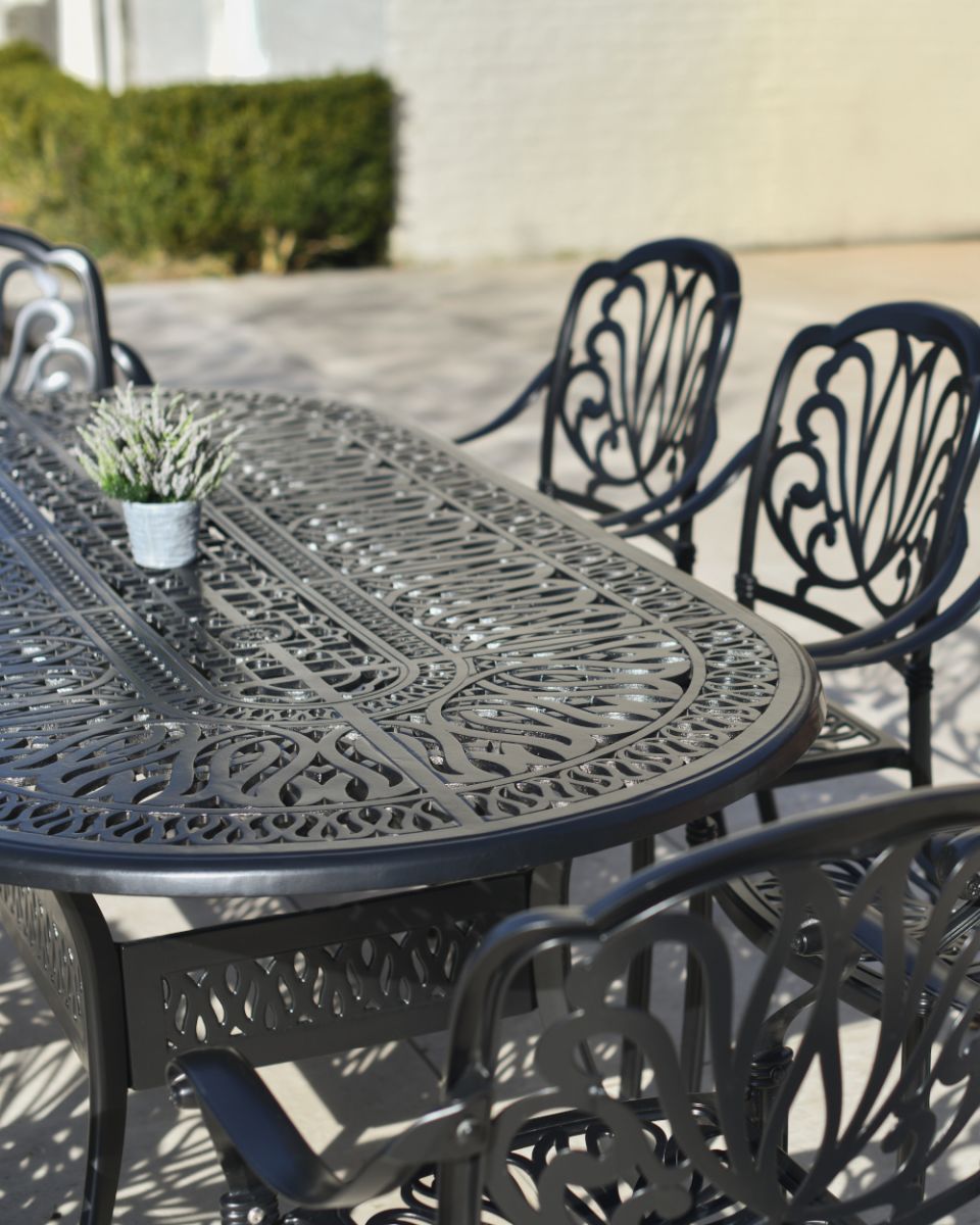 Closr Up Of The Ornate Design On The Moreville Furniture Set