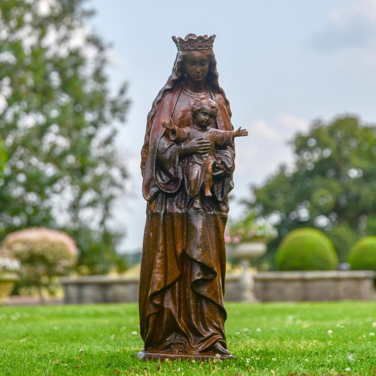Mother Mary Holding Baby Cast Iron Sculpture in Situ in the Garden
