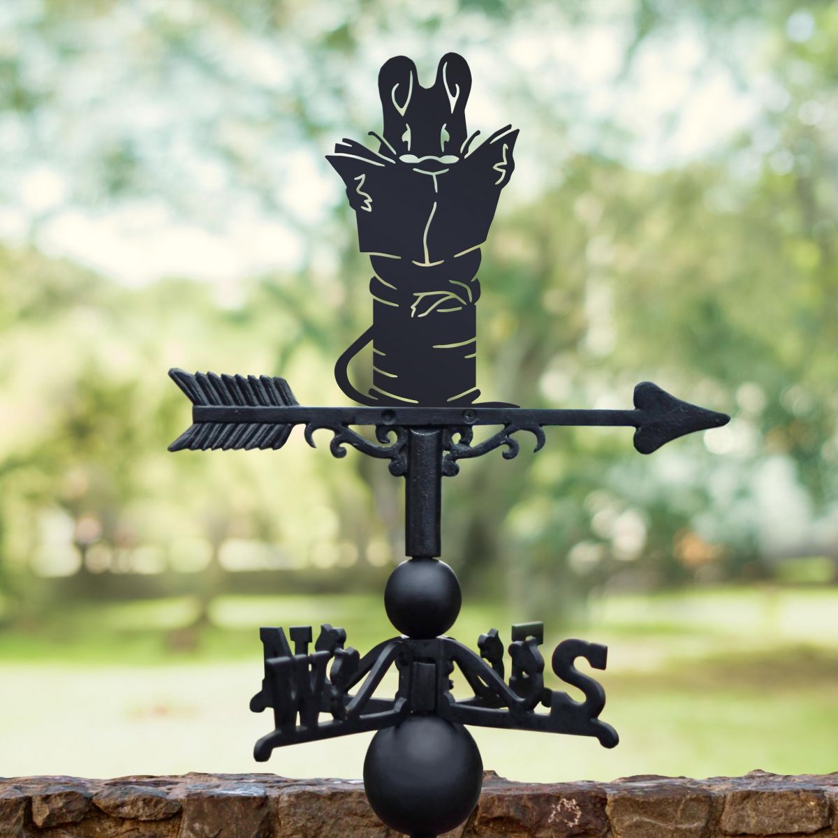Mouse on Cotton Reel Weathervane in Use in the Garden