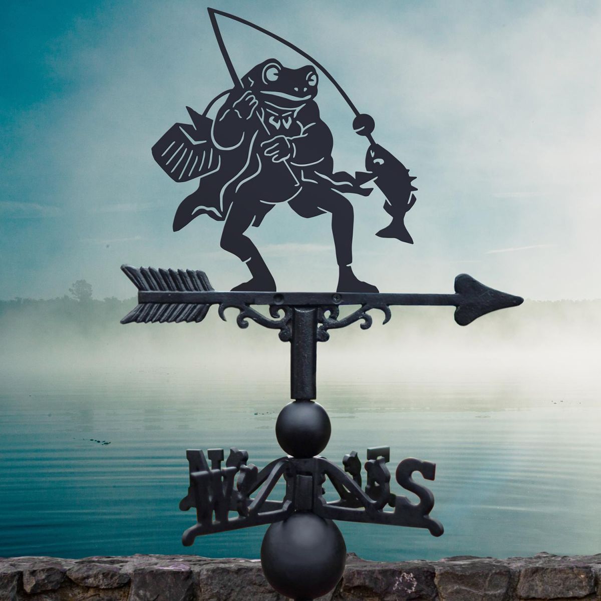 Black Mr Frog Weathervane on blue background