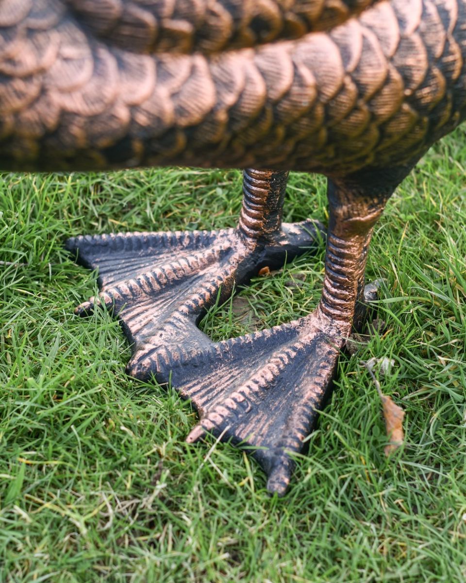 Close up of intricate cast aluminium feet detail Close up of intricate cast aluminium feet detail