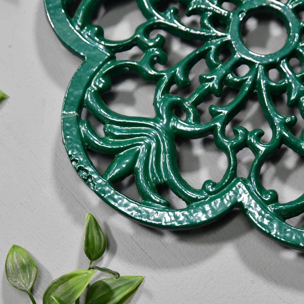 Cast Iron Flower Petal Trivet in Green Close-Up