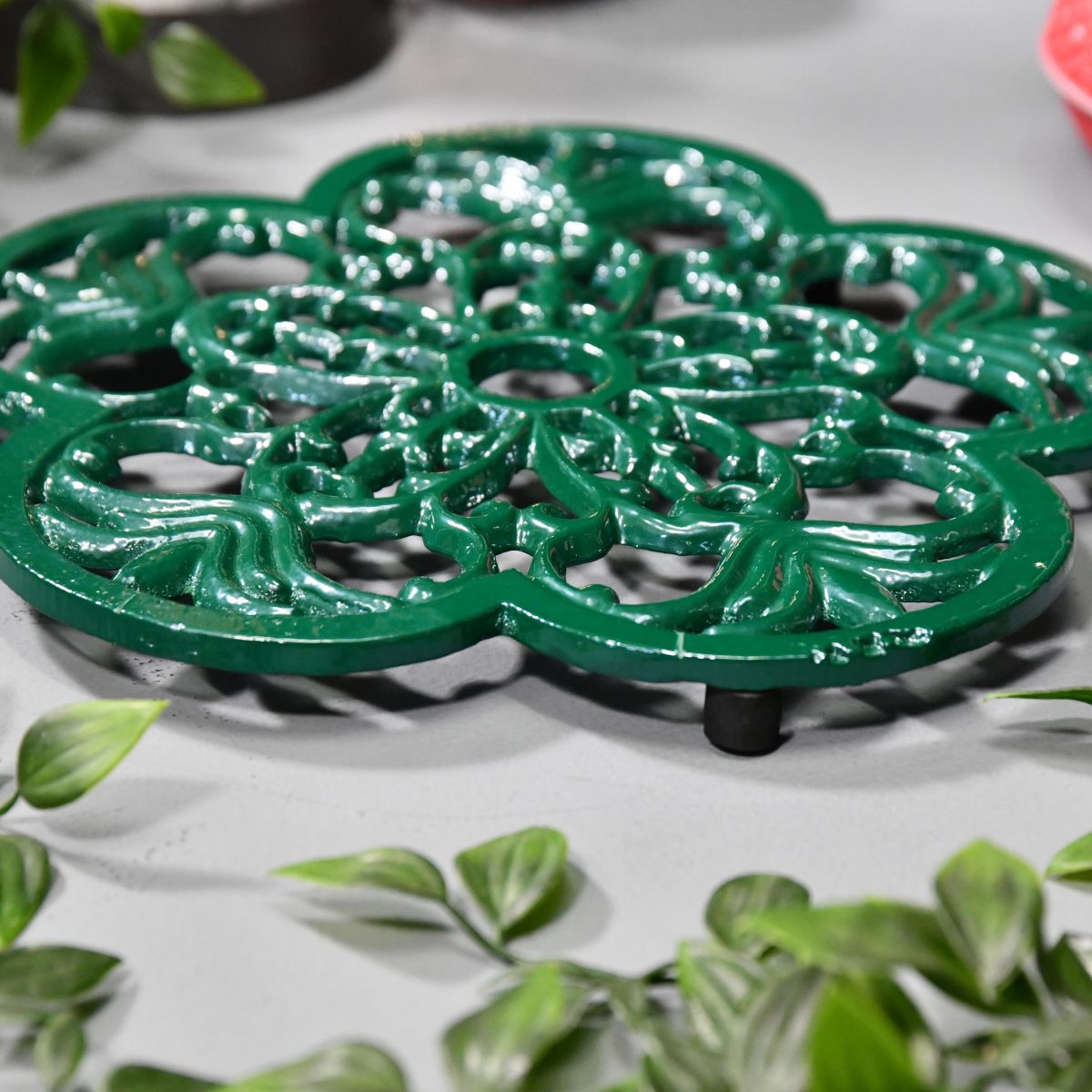 Cast Iron Flower Petal Trivet in Green Side Angle