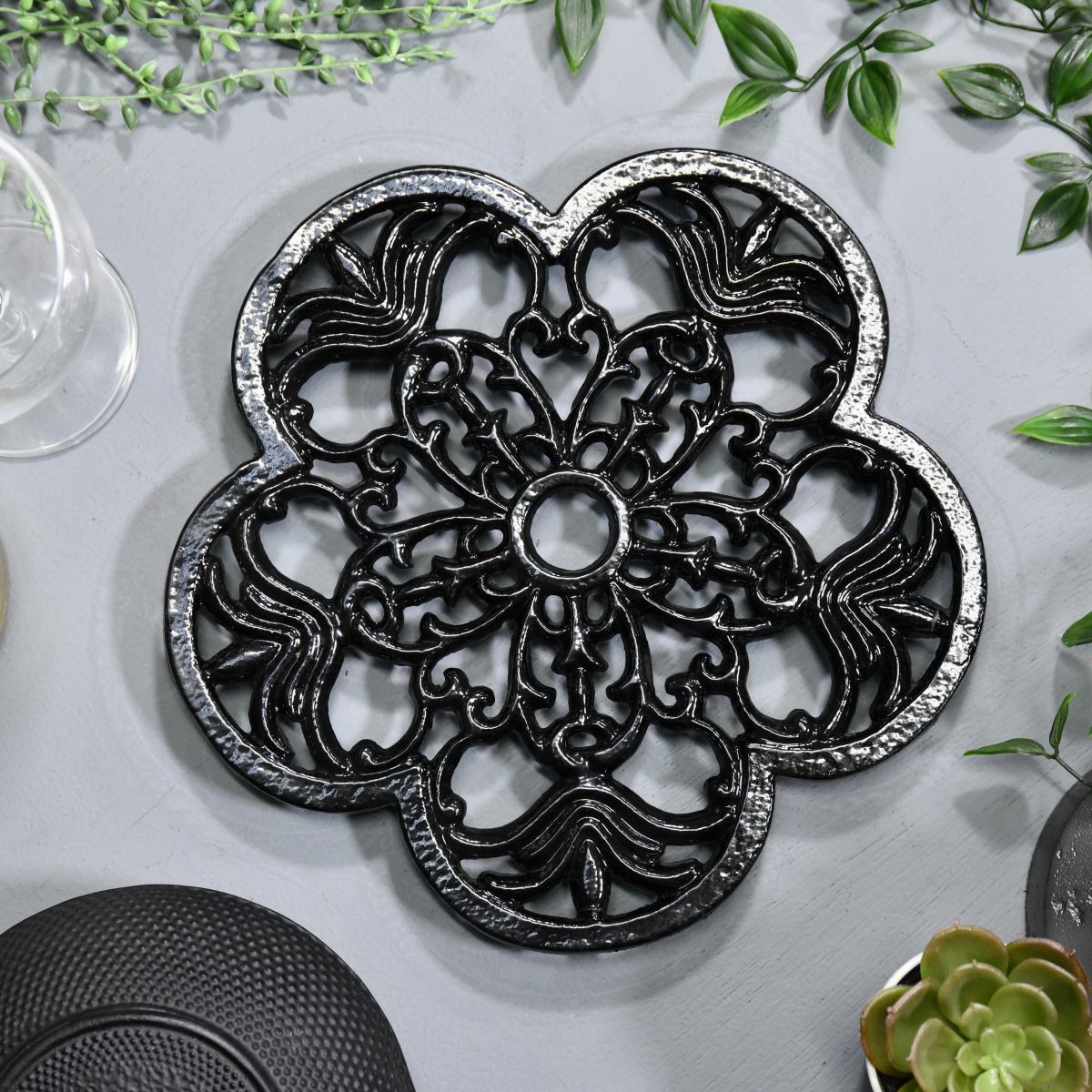 Black Cast Iron Flower Trivet in Situ