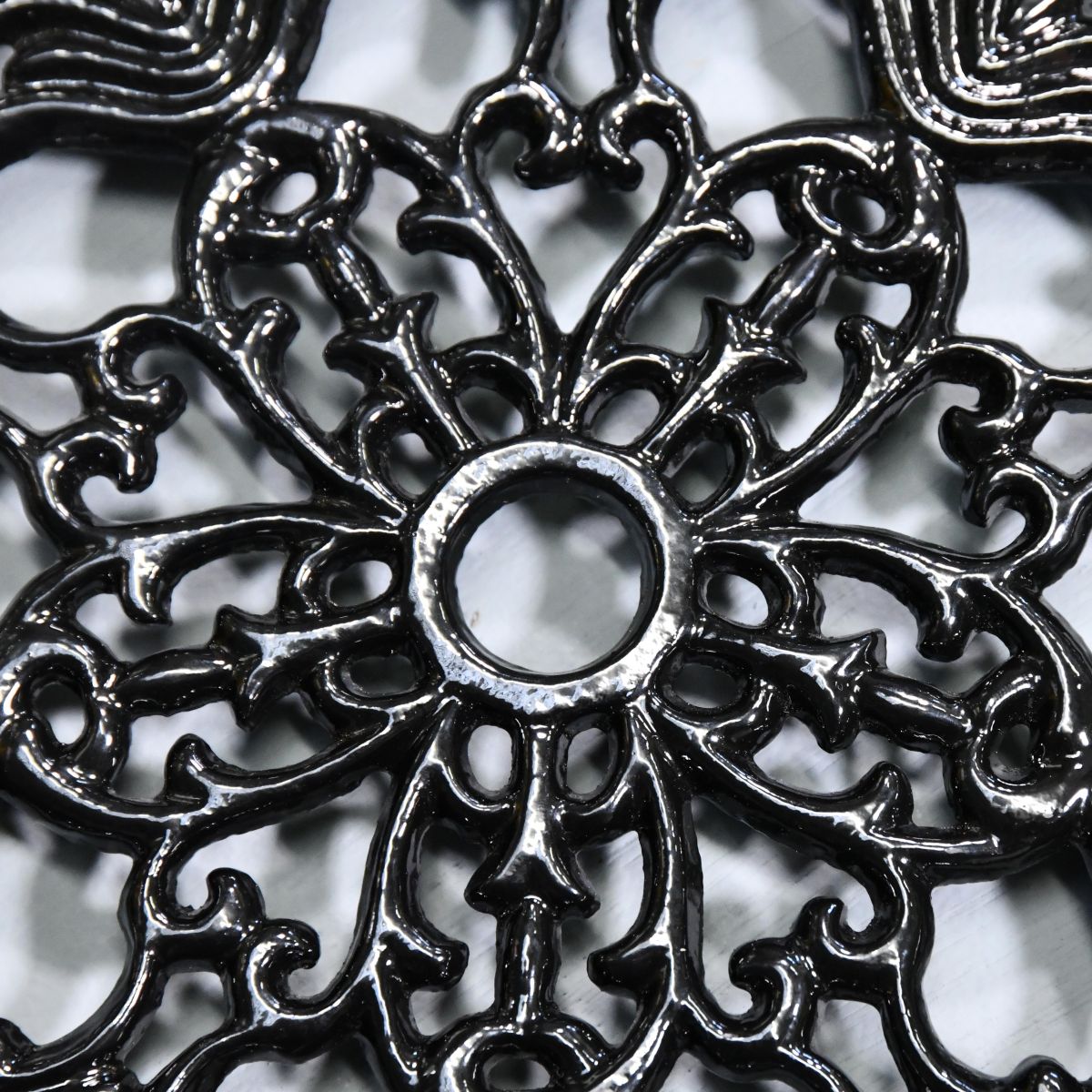 Black Cast Iron Flower Trivet Centre Close-Up