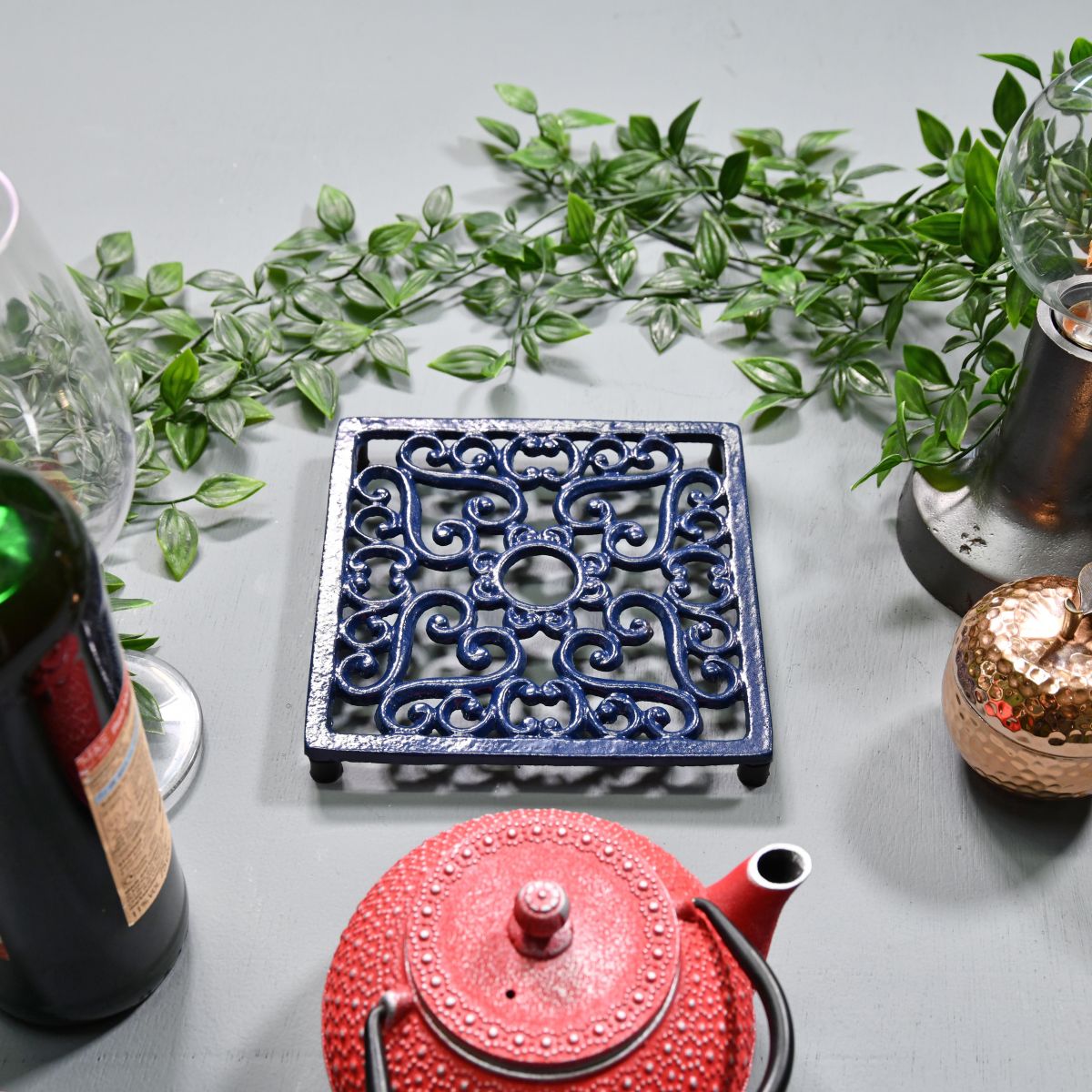 Blue Cast Iron Square Trivet in Situ with Teapot