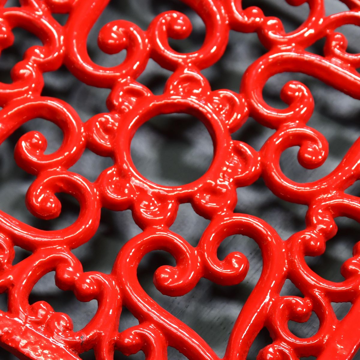Red Cast Iron Square Trivet Detailing Close-Up
