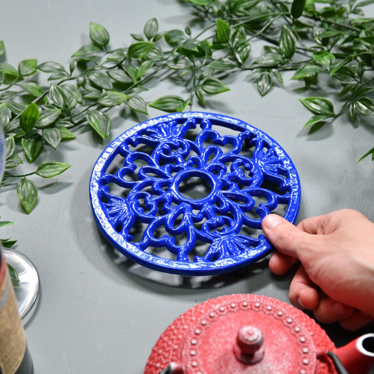 Blue Round Cast Iron Trivet to Scale