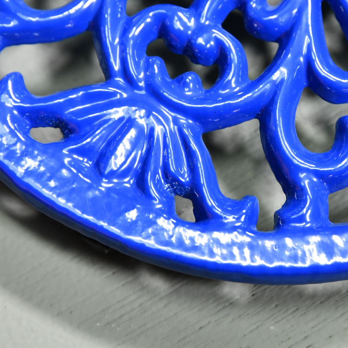 Blue Round Cast Iron Trivet Details