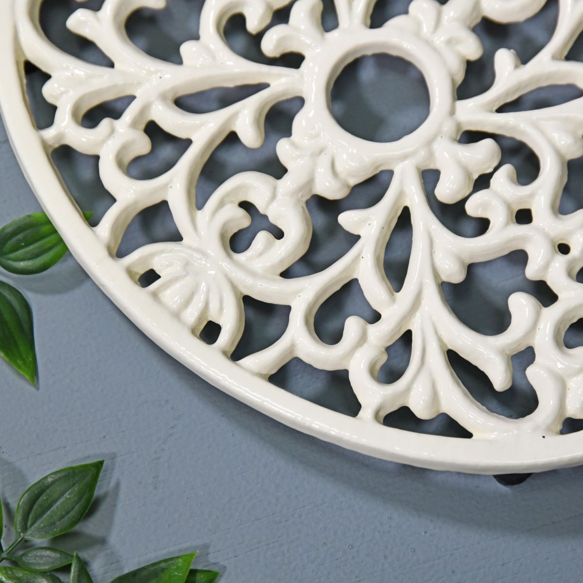 Cream Cast Iron Oval Trivet Close-Up