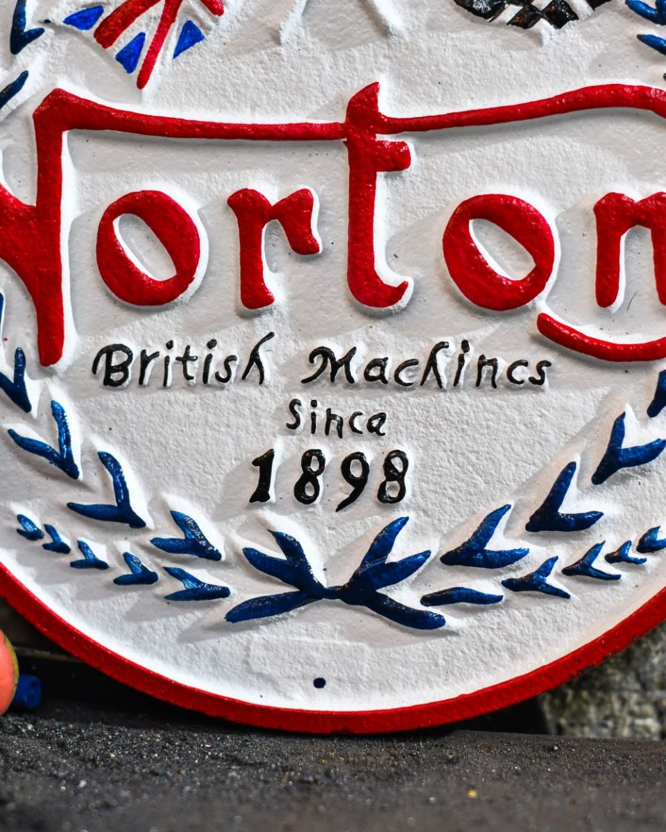 Close up of Norton British Vintage Style Cast Iron Sign finish