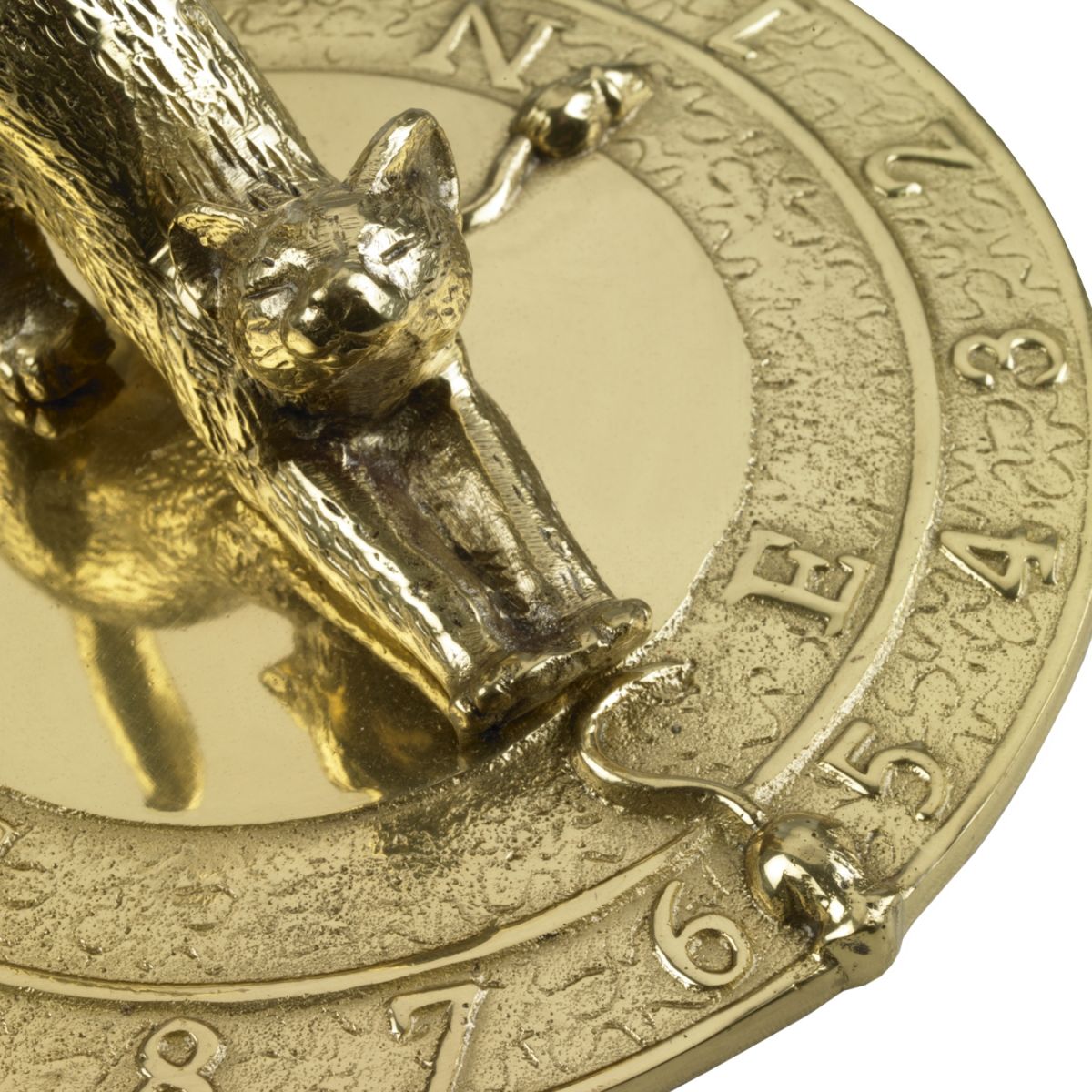 Close up of Polished Brass Feline Sundial Close up of Polished Brass Feline Sundial