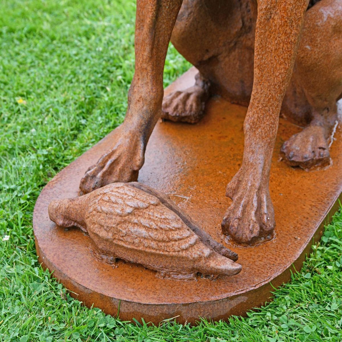 Close up of base with bird sculpture 
