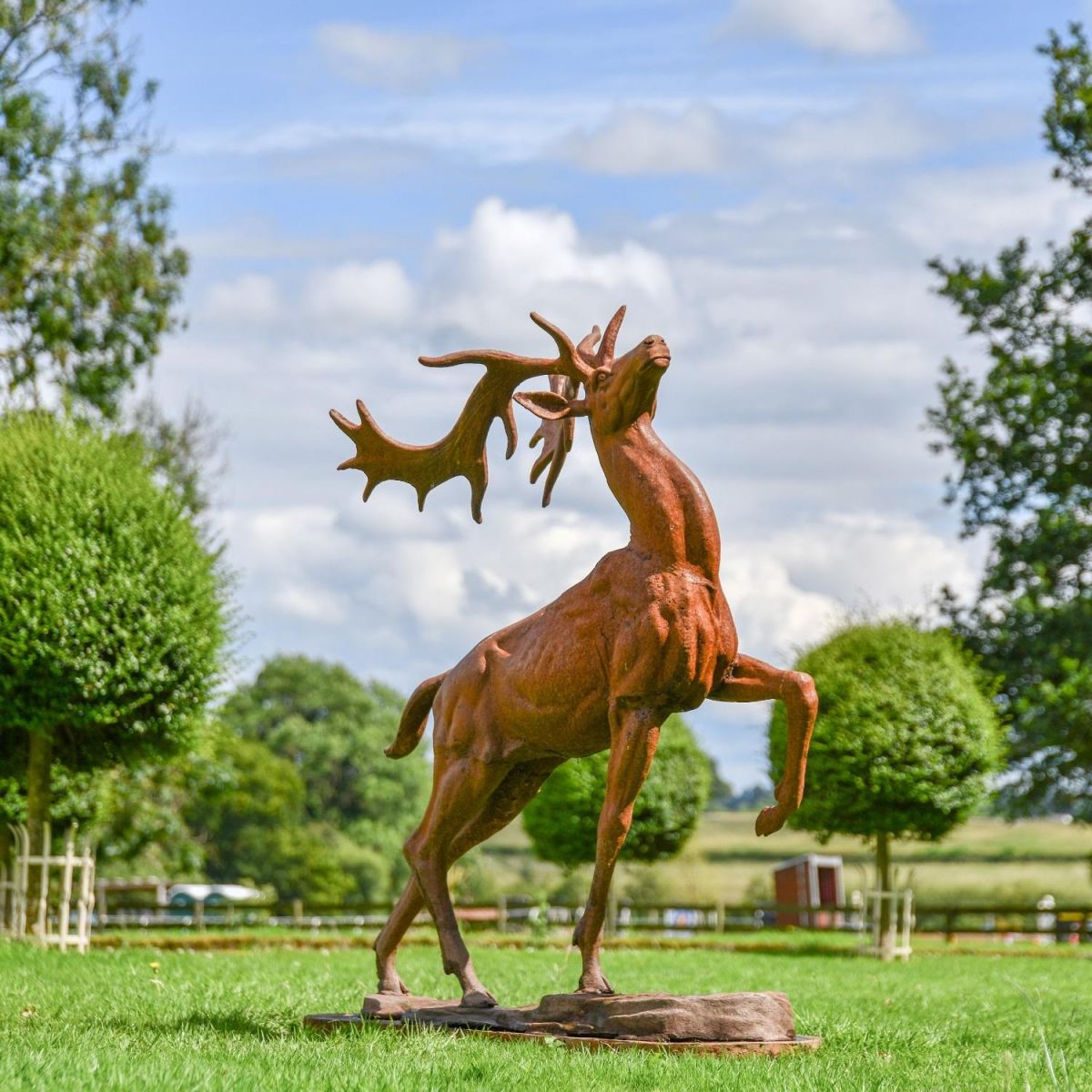 Cast Iron Stag Sculpture in Garden Setting