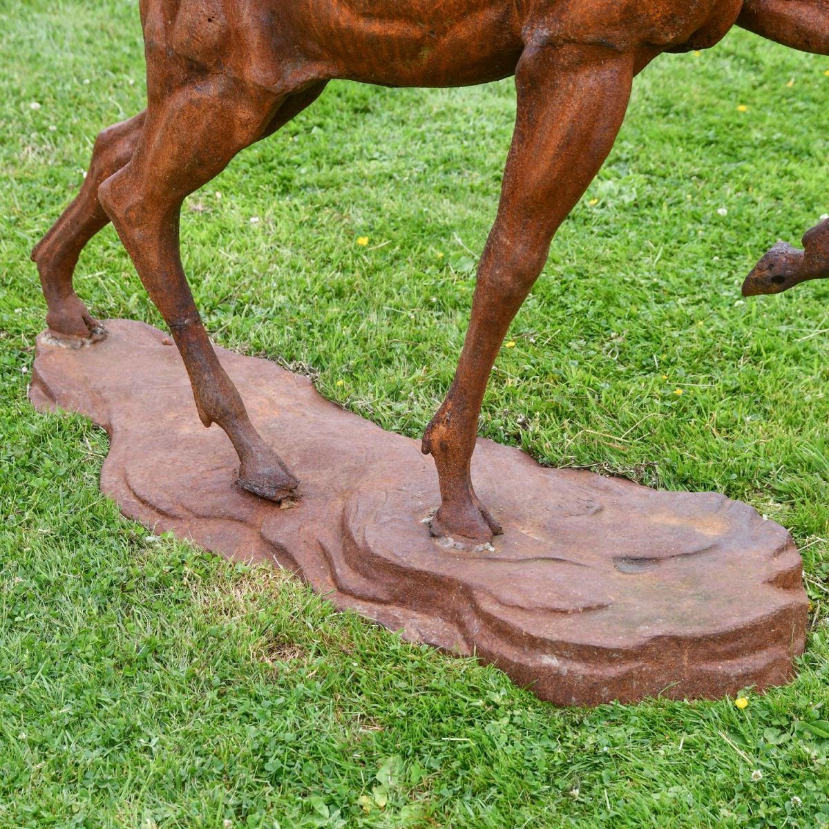 Close up of cast iron stag sculpture plinth