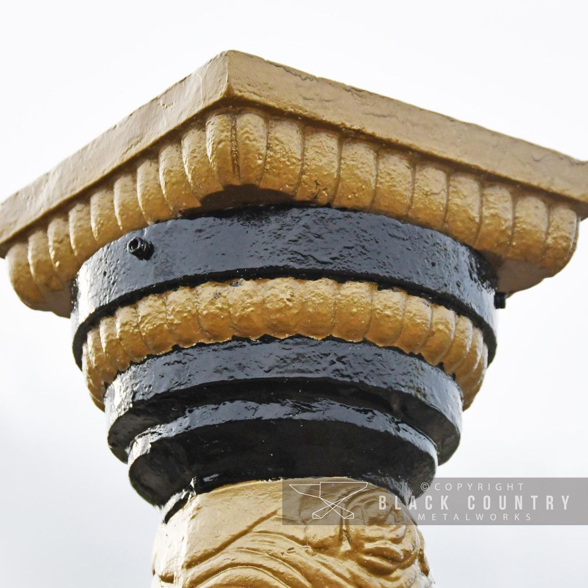 Top of the Column Finished in Gold and Black