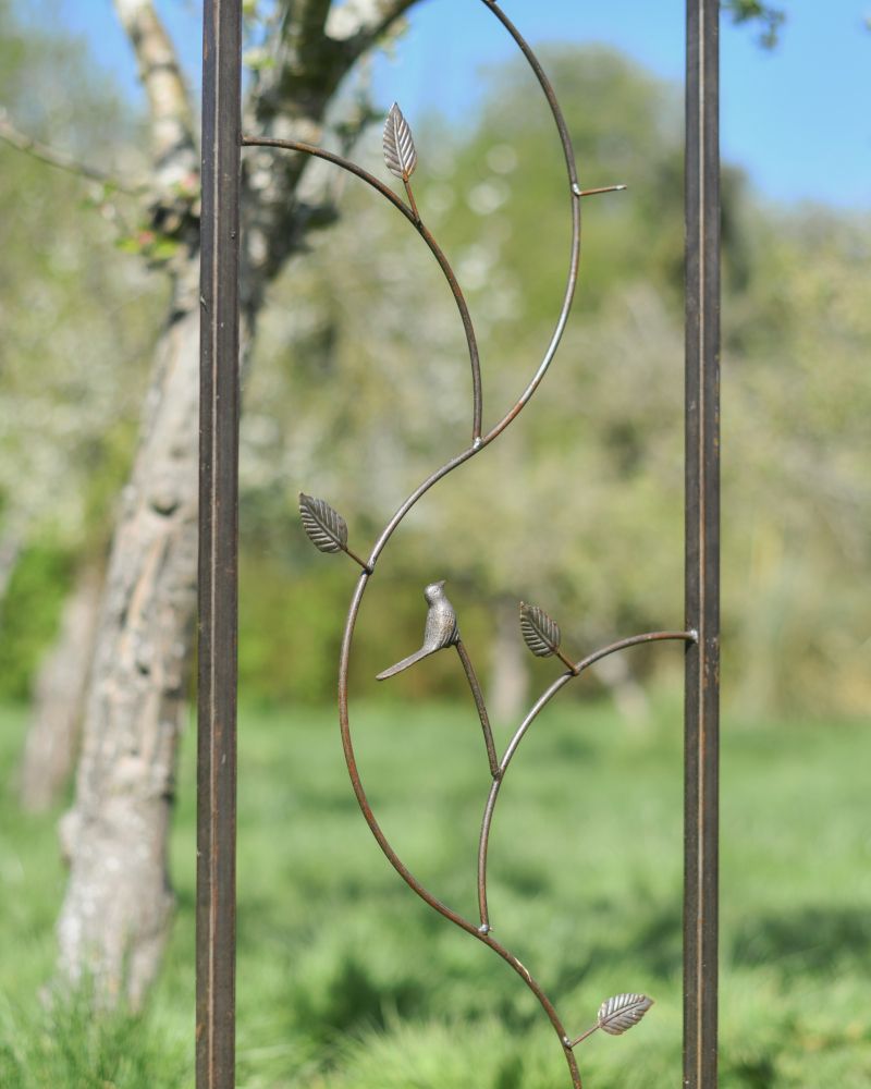 Close-up of the Bird and Leaf Design on the Side of the Rose Arch