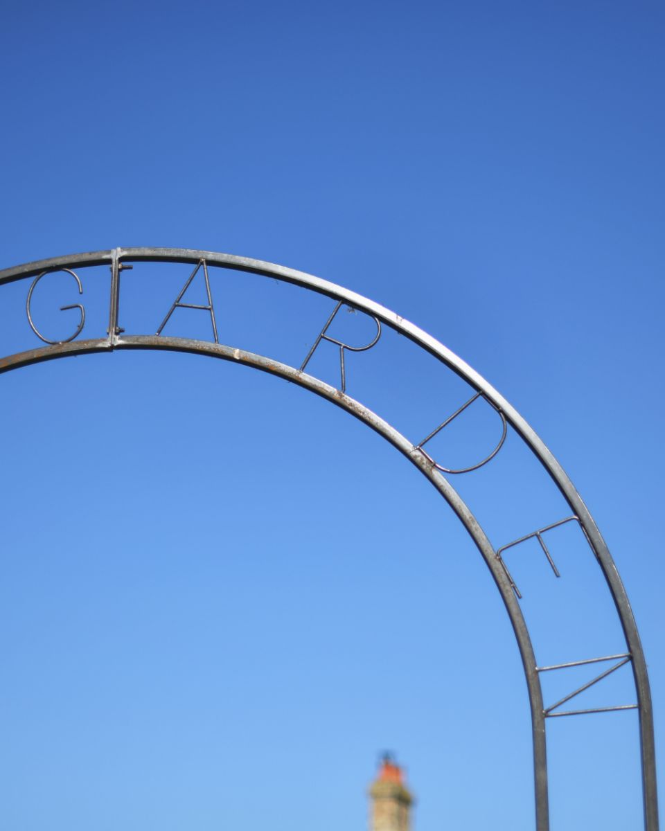 Close Up Of The Ornate Natural Lacquer Finish on a Rose Arch  Close Up Of The Ornate Natural Lacquer Finish on a Rose Arch