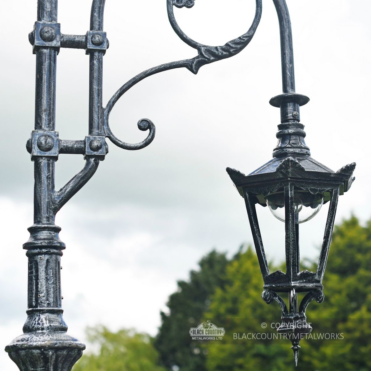 Ornate Lamp Post Bracketry With Scroll Work and Lantern Ornate Lamp Post Bracketry With Scroll Work and Lantern