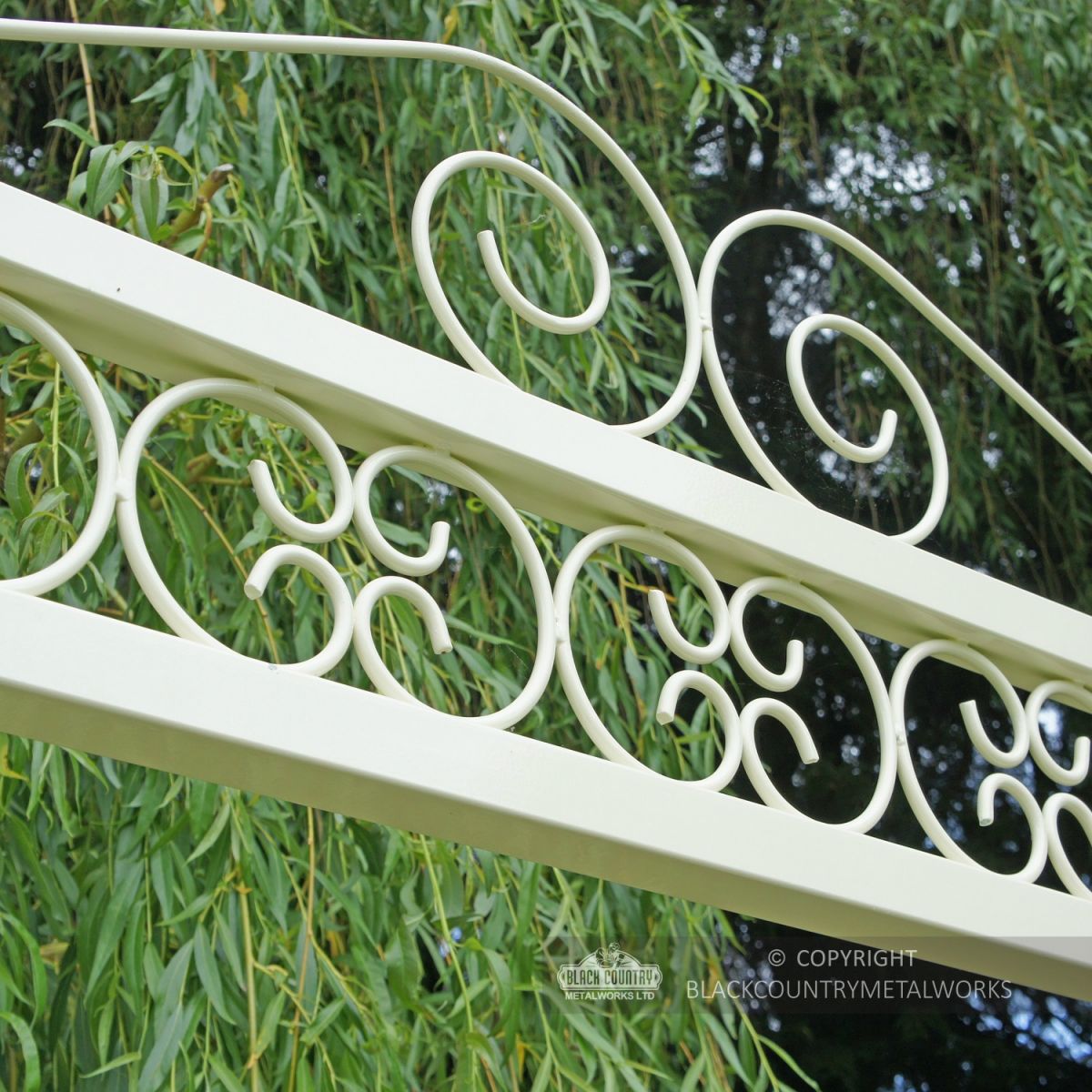 Ornate scroll work on top of swing seat