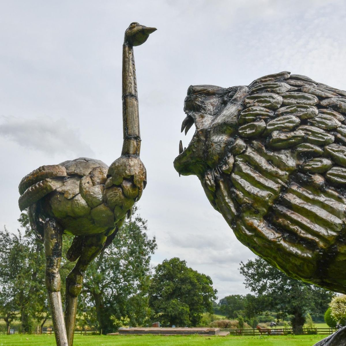 Scene with Ostrich and Lion Sculpture 