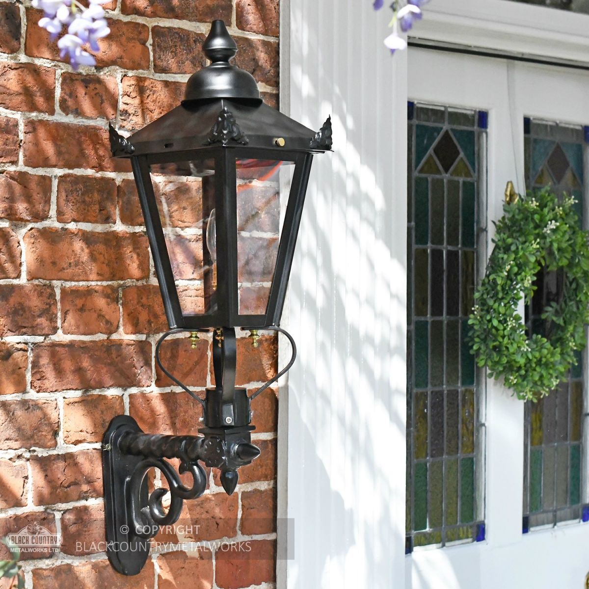 Outdoor garden wall lantern by front door