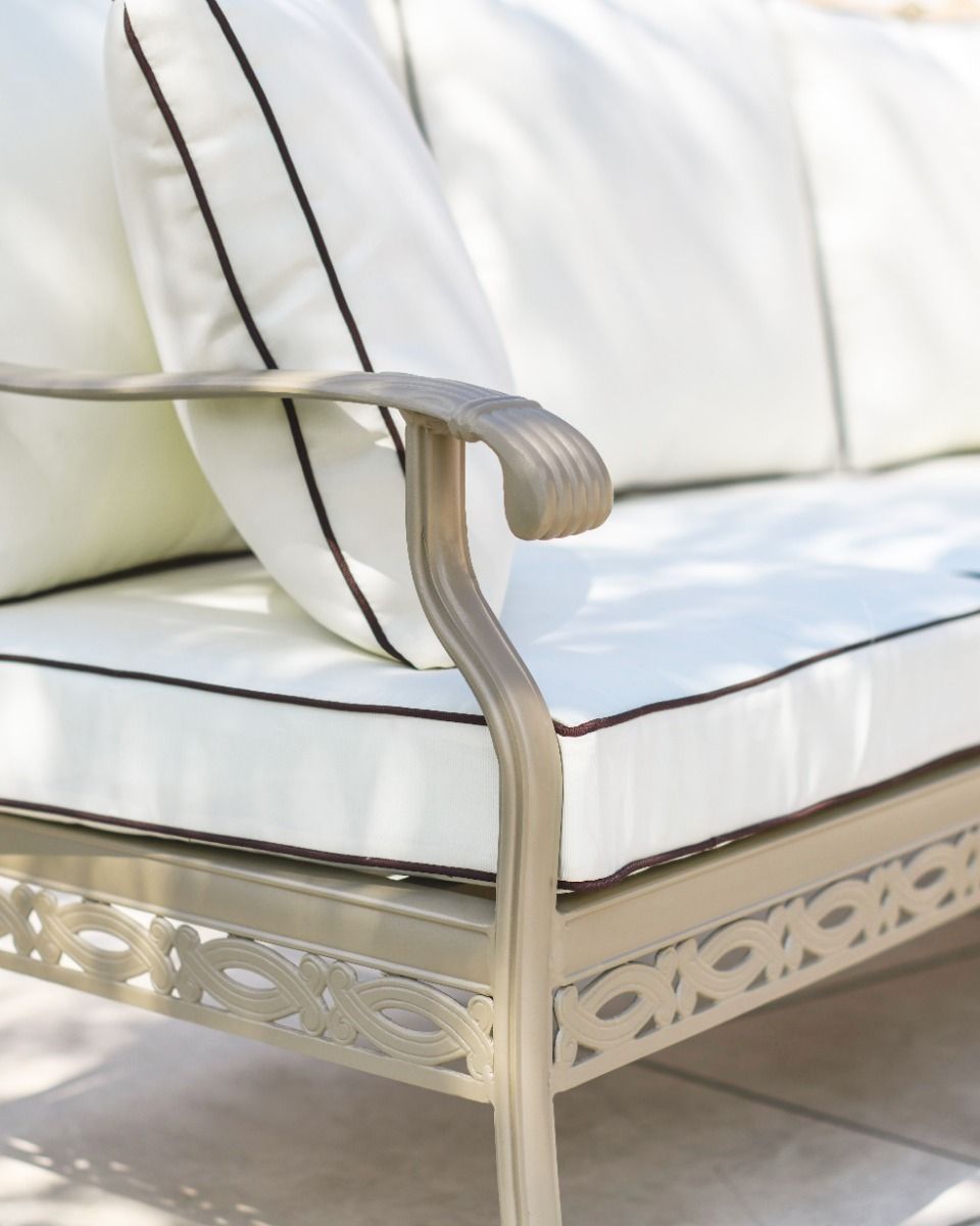 Close up shot of the sofas rolled armrests.