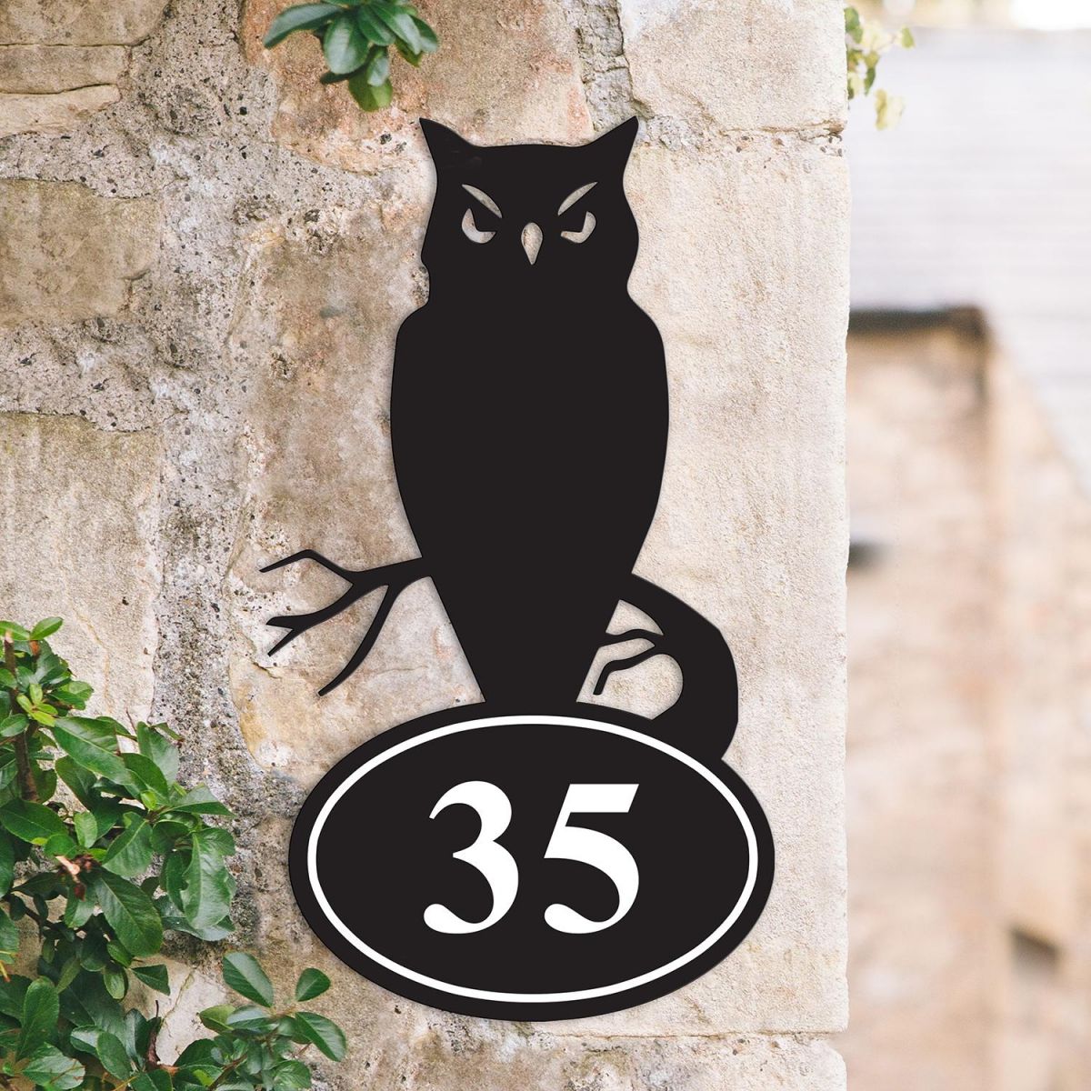 Bespoke Owl Iron House Number Sign on a Garden Wall