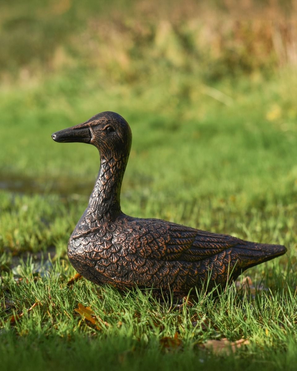 Pair of Cast Aluminium Ducks Sitting Version in a Bronze Finish
