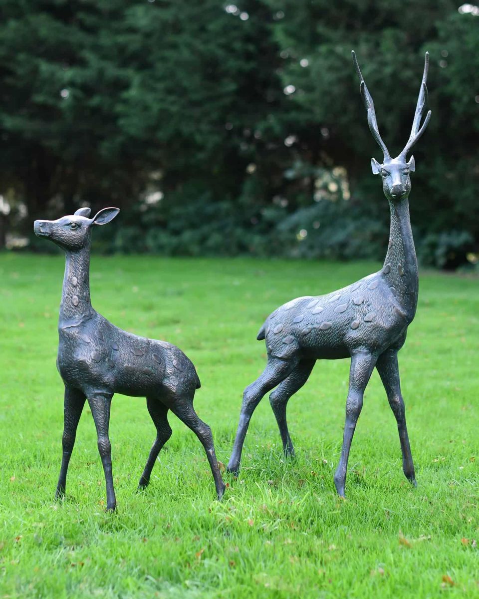 Pair of Cast Aluminium Freestanding "Fallow" Stag & Doe Garden Sculptures in the Garden