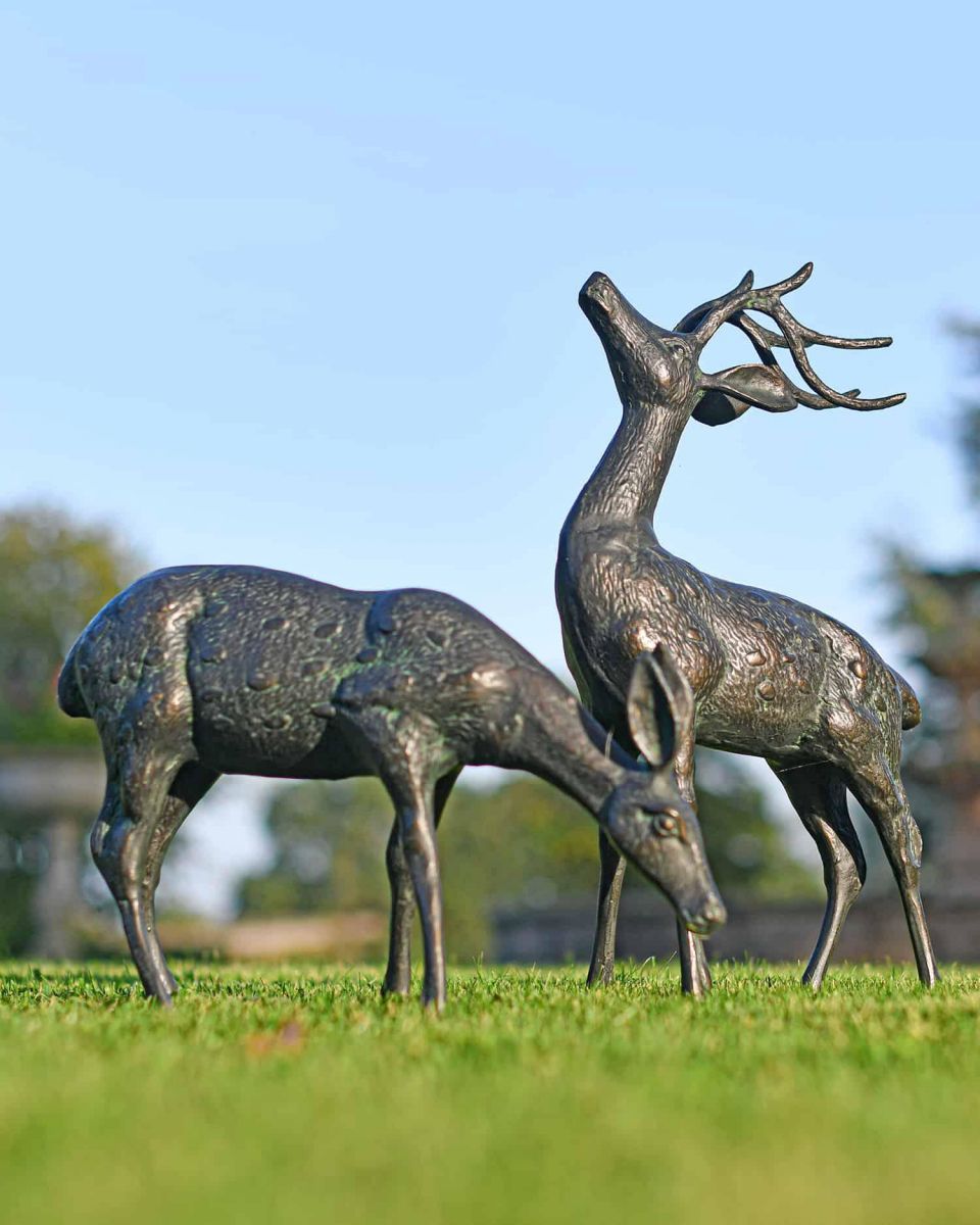 Pair of Miniature Aged Verdigris "Starlight & Moondust" Stag & Doe Garden Sculptures in the Garden