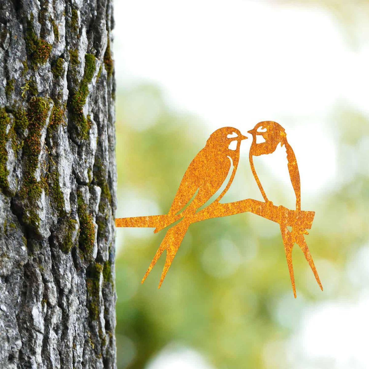 Rustic Pair of Swallows Steel Tree Spike in Situ Rustic Pair of Swallows Steel Tree Spike in Situ